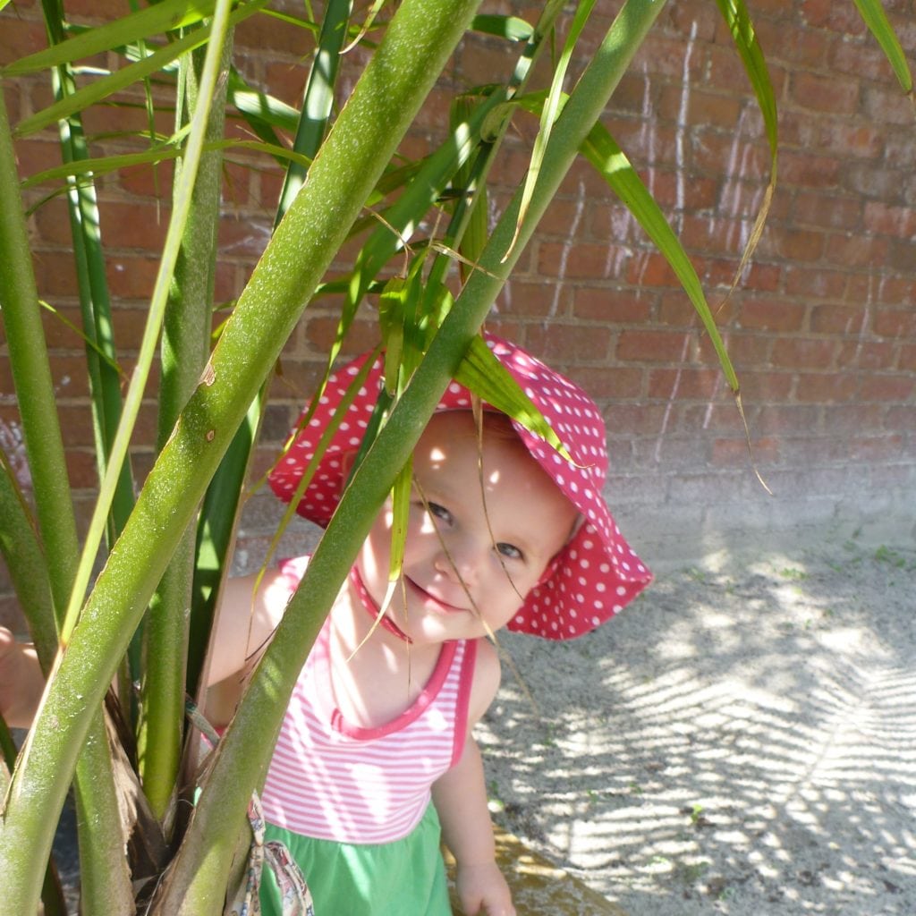 sq Our Neighborhood Curious Baby Peeking Out Playing Outside